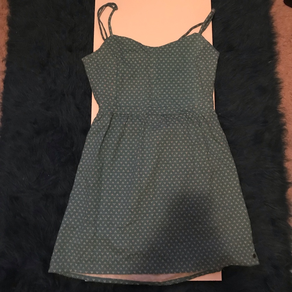 Pretty bluish greenish dress with open back